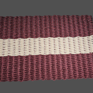 Handwoven burgundy lobster rope doormat with one light tan stripe