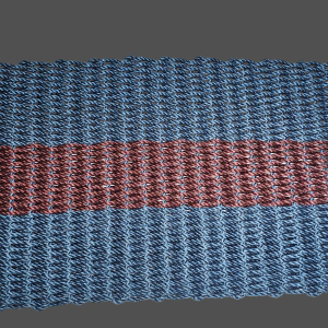Handwoven lobster rope doormat in navy with one burgundy stripe